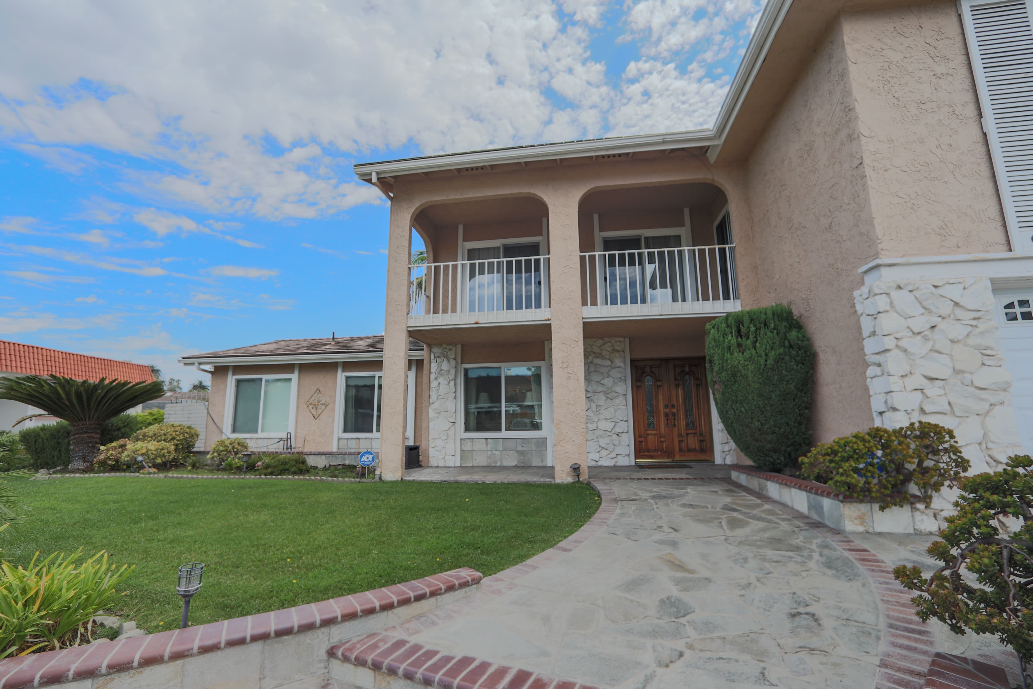 Front entry approach to 720 Pepper Tree Lane in Bixby Hill
