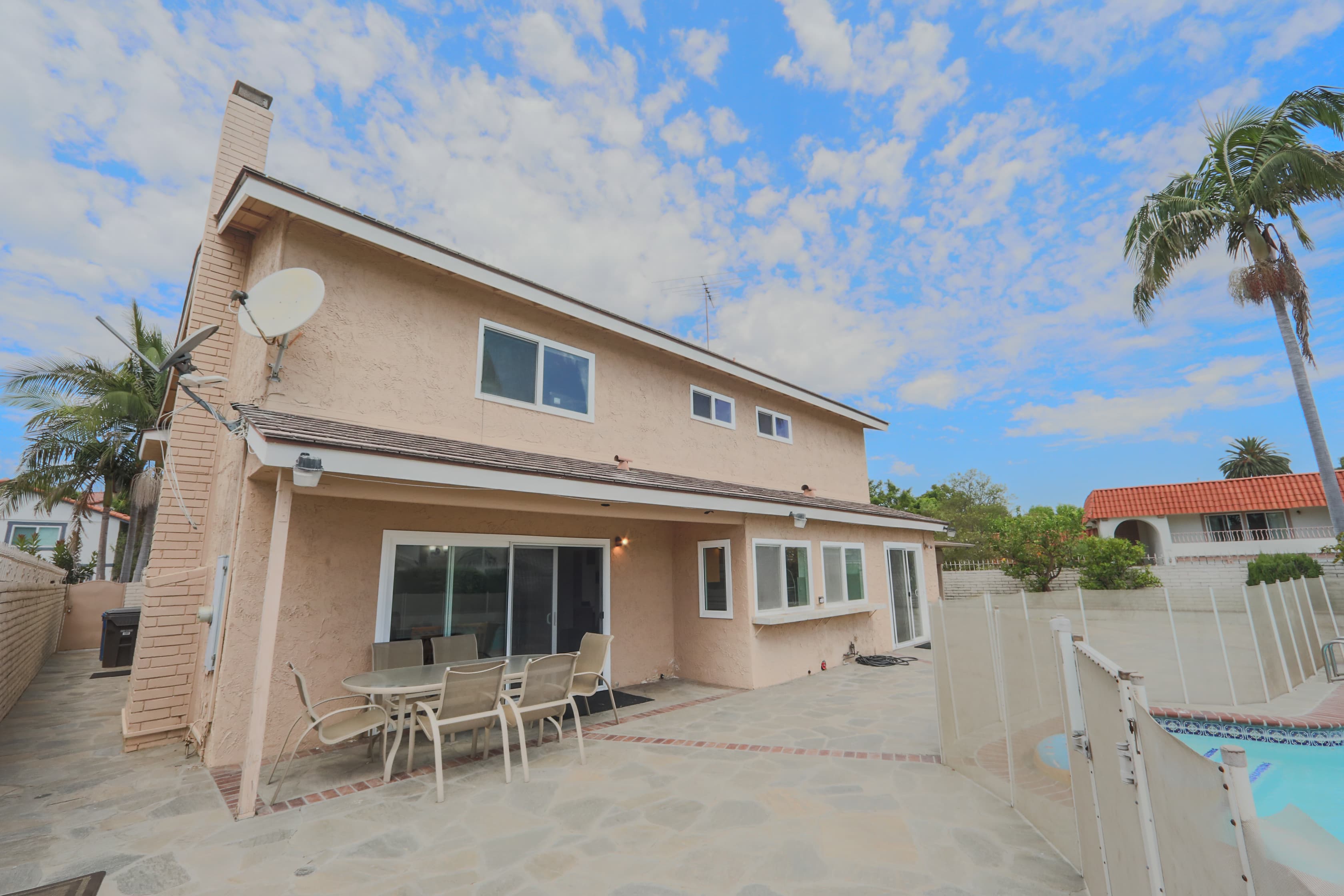 Poolside rear angle at 720 Pepper Tree Lane